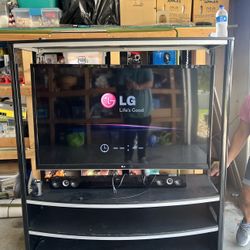 LG Tv, LG Sound Bar, Entertainment Stand