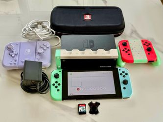 Nintendo Switch + Pokémon Sword Game + HORI Split Pad + Extra Joy-Cons + Travel Case