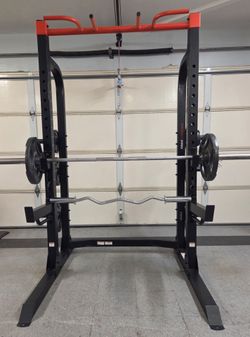 Olympic weight plates (270lbs), half rack and straight and curl bars deal