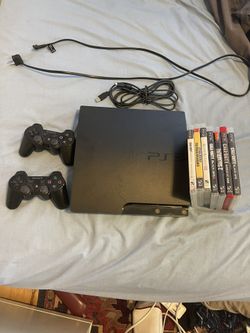 Used PlayStation 3 + 2 Controllers And Games