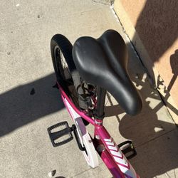 It’s A Bike The Color Is Pink And White It’s A RoyalBaby