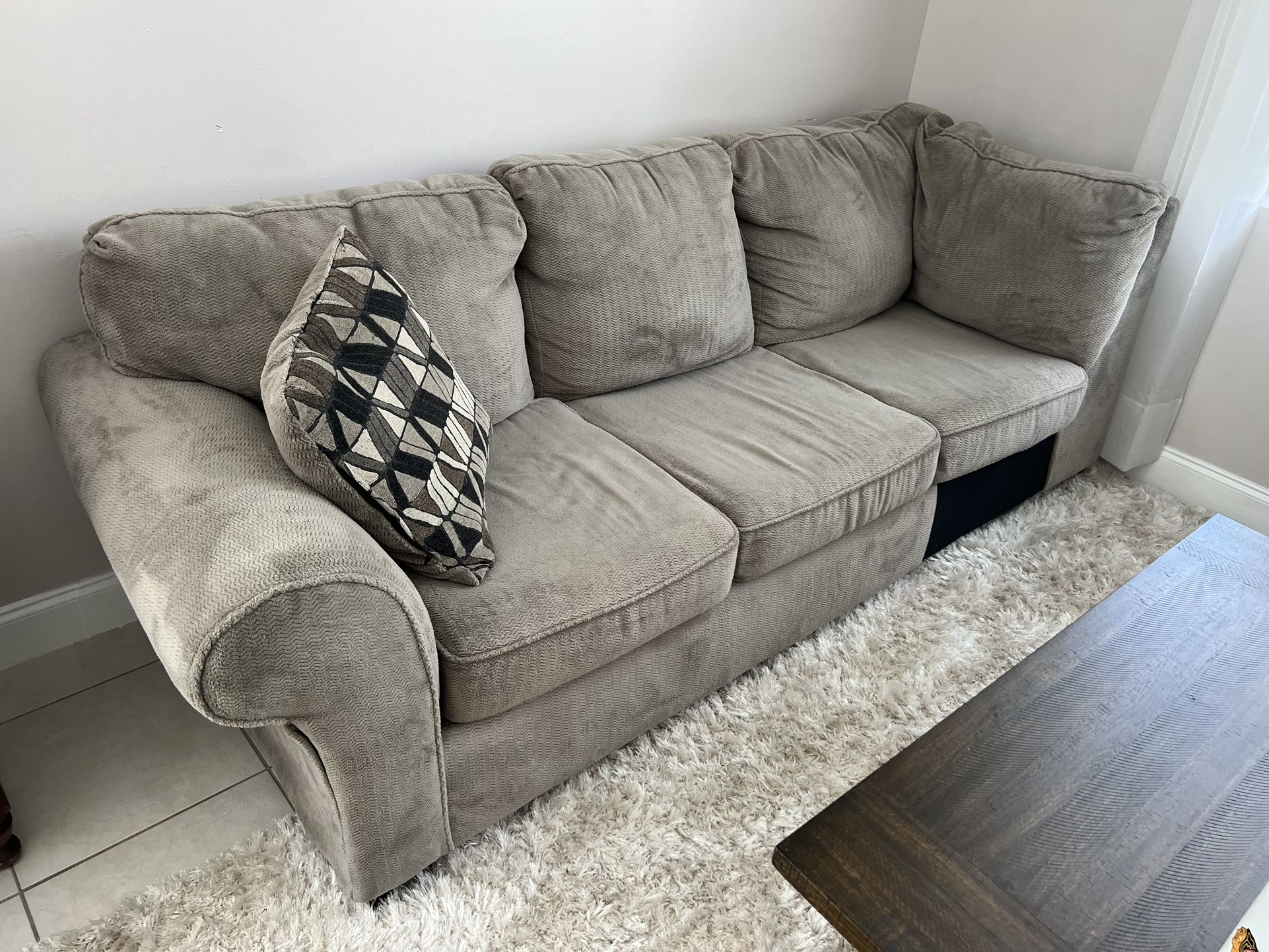 Delivery Available! Grey Upholstered Love Seat Living Room Sofa Couch! Clean and Comfortable! Good condition! Rip in back right corner, easy to concea