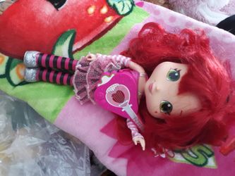 Strawberry shortcake doll and blanket. Doll smells like strawberries.