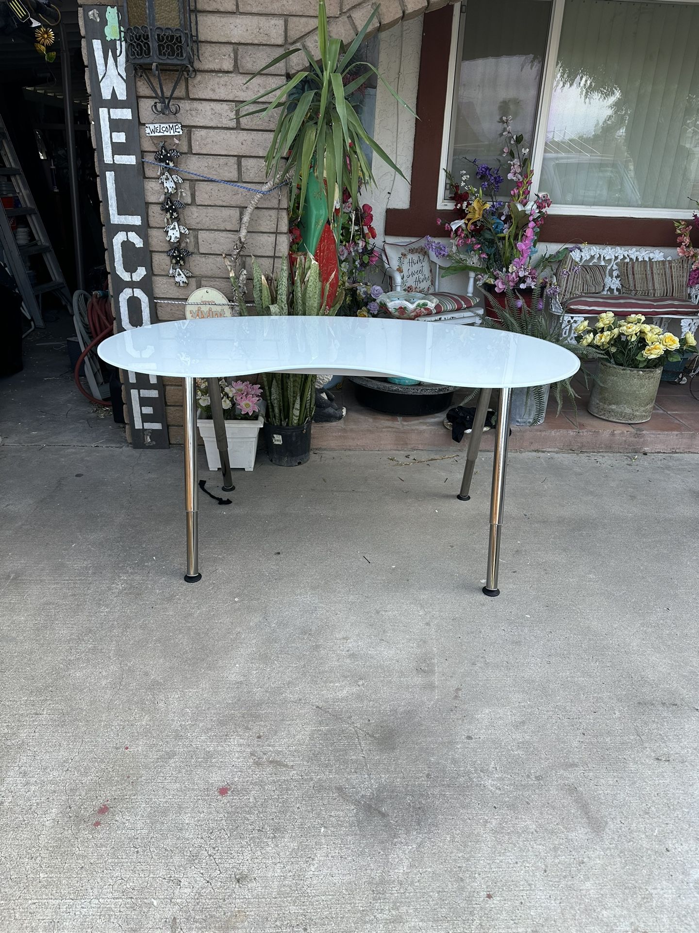 Beautiful glass top chrome legs desk