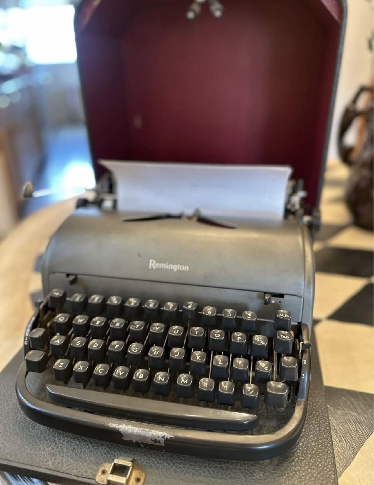 Vintage 1949 Remington Rand portable typewriter with original case. Works!