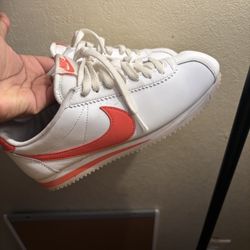 orange Nike cortez