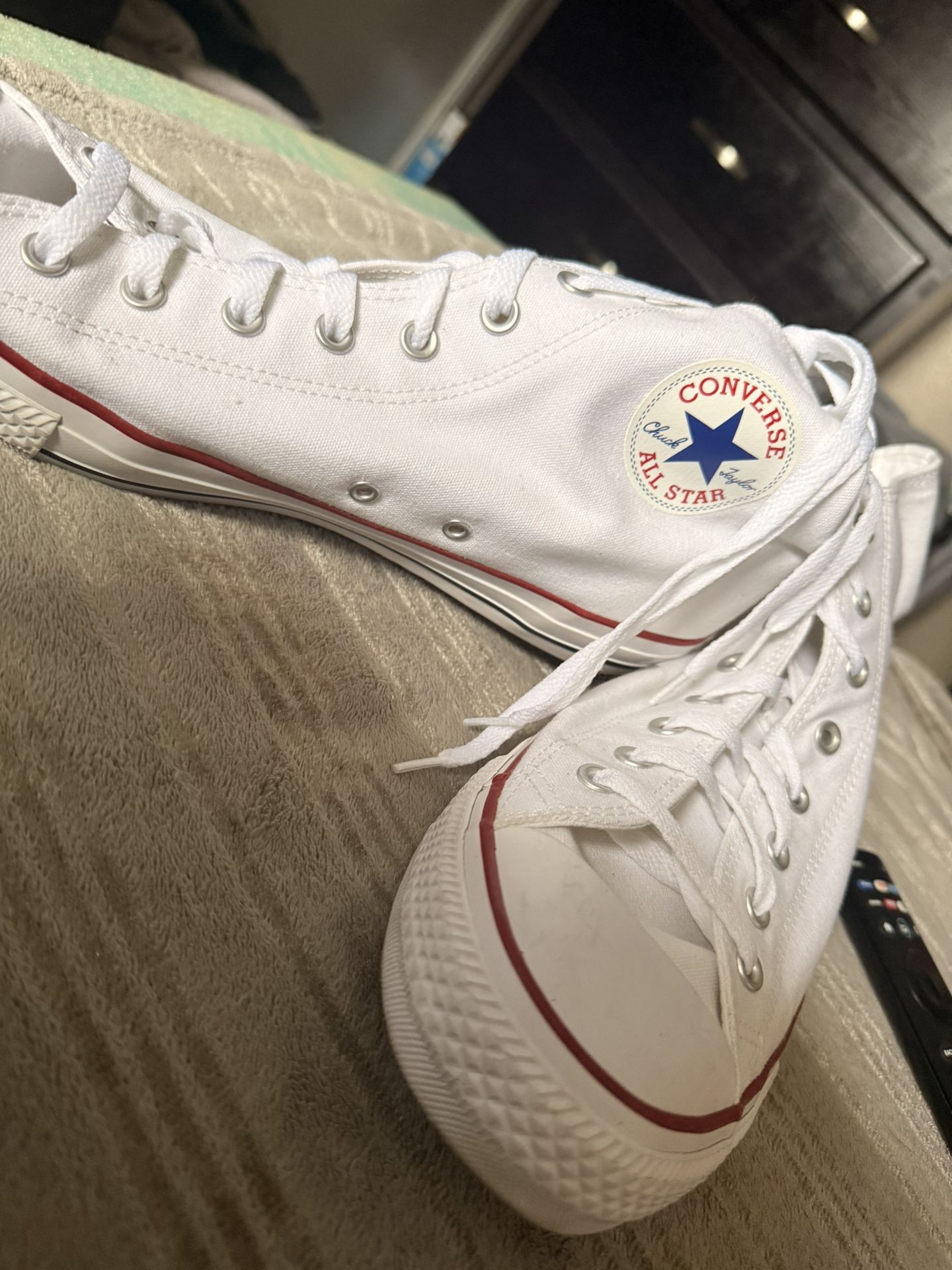 Converse Chuck Taylor All Star low-top sneakers in white canvas