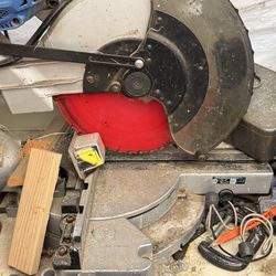 12 inch Dewalt miter saw w/ new finish blade