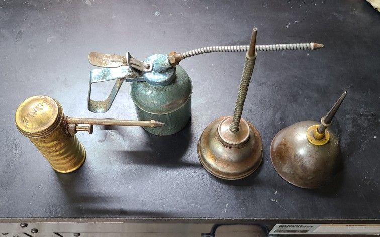 VINTAGE OIL CANS