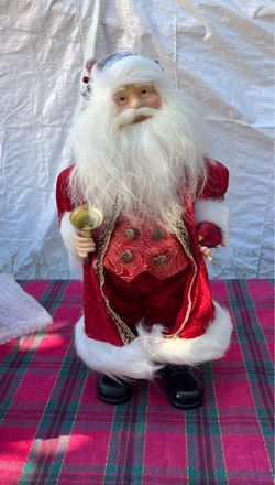 Home Interiors and gift. Traditional Red Velvet Santa Claus Figurine with Bell and Bird.