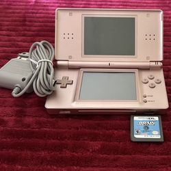 Nintendo DS Lite with a game, complete with a stylus, and new charger. $35