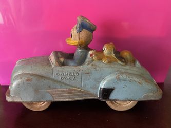 Vintage Rubber Donald with Pluto car