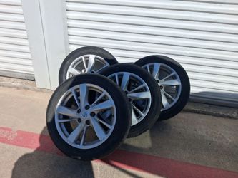 17' nissan oem Atima tires and wheels