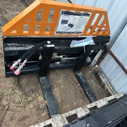 Skidsteer hydraulic forks