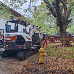 Bobcat  And Excavator 