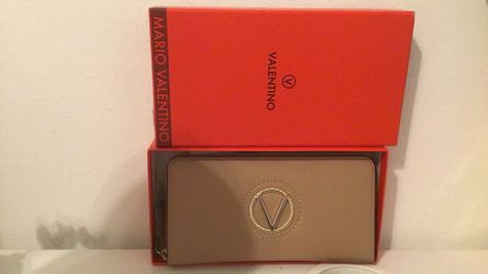 Brand: Valentino. Color: Beige. Model: Katong / Katon Zip Around Wallet. Approximate Dimensions: 19-20 cm (width) x 10 cm (height) x 2.5-3 cm