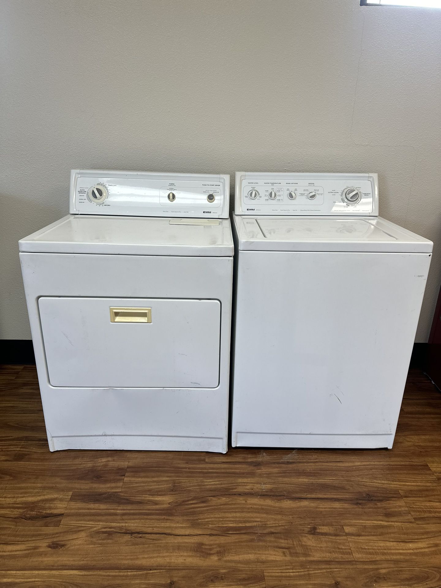 Kenmore 80 series XL Capacity  Electric washer and dryer , comes with a 30-day warranty.