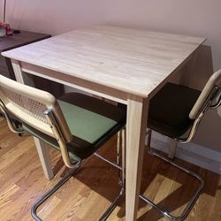 36 High Table with Green velvet chairs