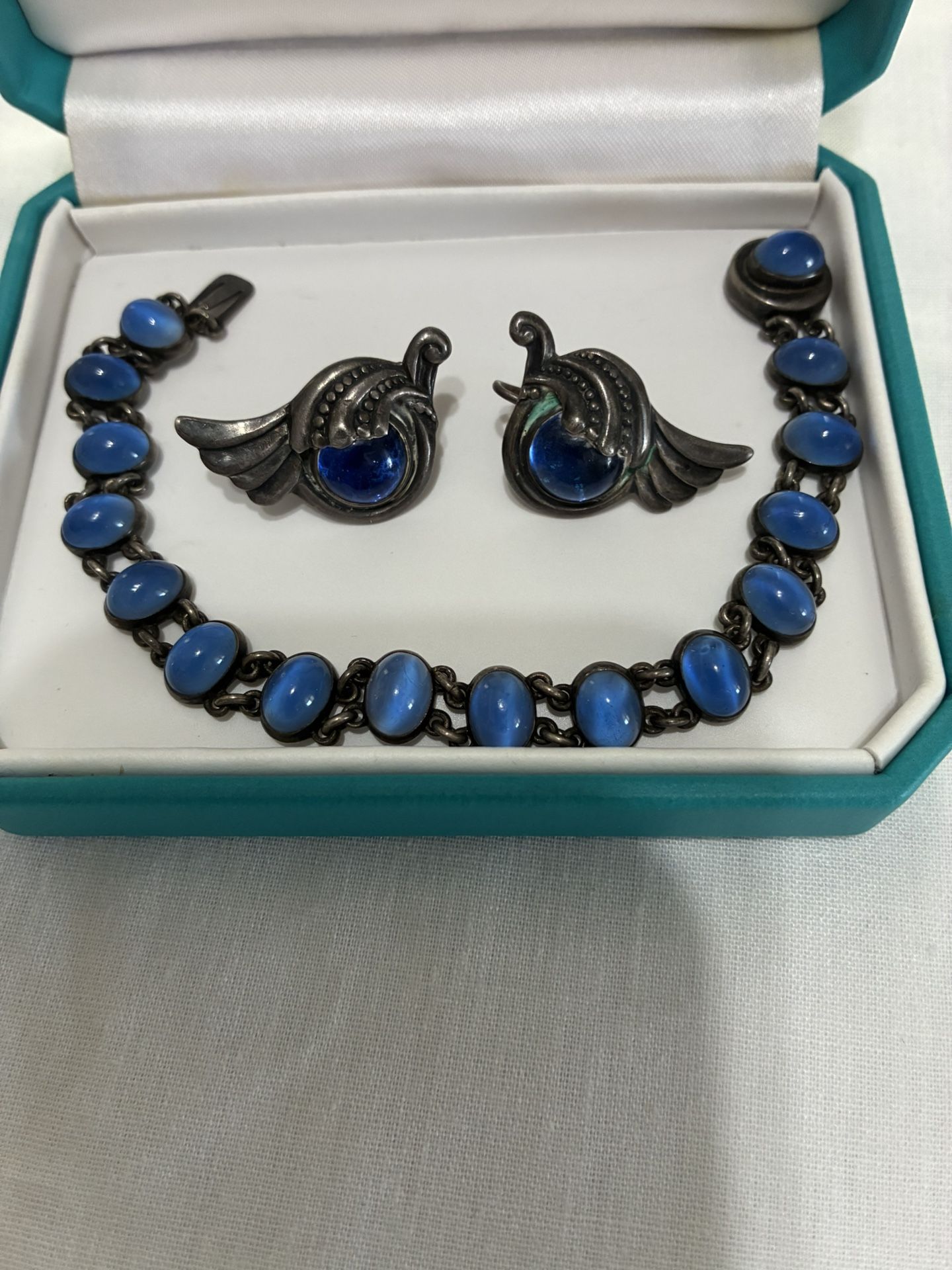 Silver Earrings And Bracelet 