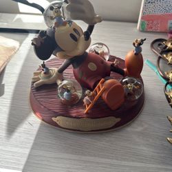 The image shows a Disney Mickey Mouse "Mickey's 1932 Commemorative Musical Snow Globe. 