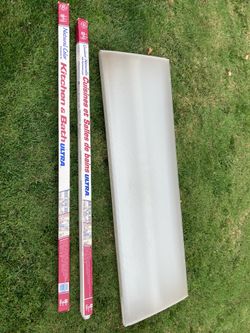 Shop light with fluorescent bulbs