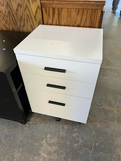 Small white filing cabinet drawers (in store)