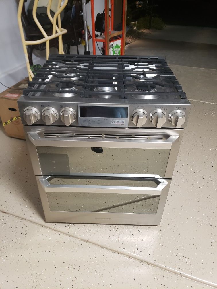 LG Signature dual oven with 5 gas burners and electric oven brand new