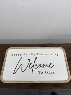 Disney Winnie the Pooh wall art featuring a clean sketch-style design of Pooh and Piglet in a field of flowers. Framed in a wood-tone finish. 	•	Offic