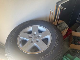 Old Jeep Rims with Tires