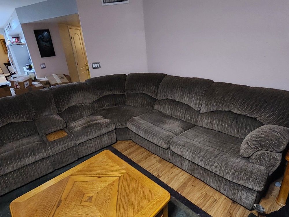 Sectional Sofa W/ Dual Recliners And Pull-out Bed