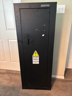 Sentry metal gun storage cabinet with key lock