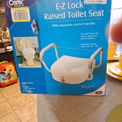 NEW E-Z LOCK RAISED TOILET SEAT. $30 FIRM PRICE 
