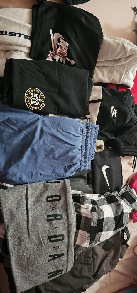 Clothes And 2 Backpacks