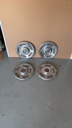1967 Malibu hub caps.