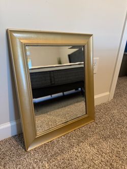 Gold mirror