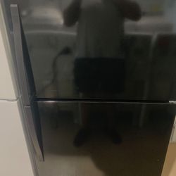 Whirlpool refrigerator top and bottom new scratch and dent 