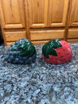 Vintage Purple Grapes and Strawberry Salt & Pepper.  Preowned new never used with tags.  The lighting in the picture is bad there are no white spots o