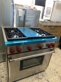 Wolf 36” slide in range with middle grill in stainless steel all gas