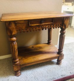 Carved wooden accent table