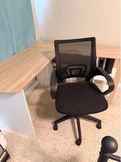 White and brown corner table with computer rolling chair