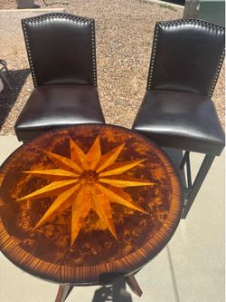 Round starburst inlay pub table with 2 barstools