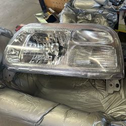 Brand New Head Light For A Dodge Caravan