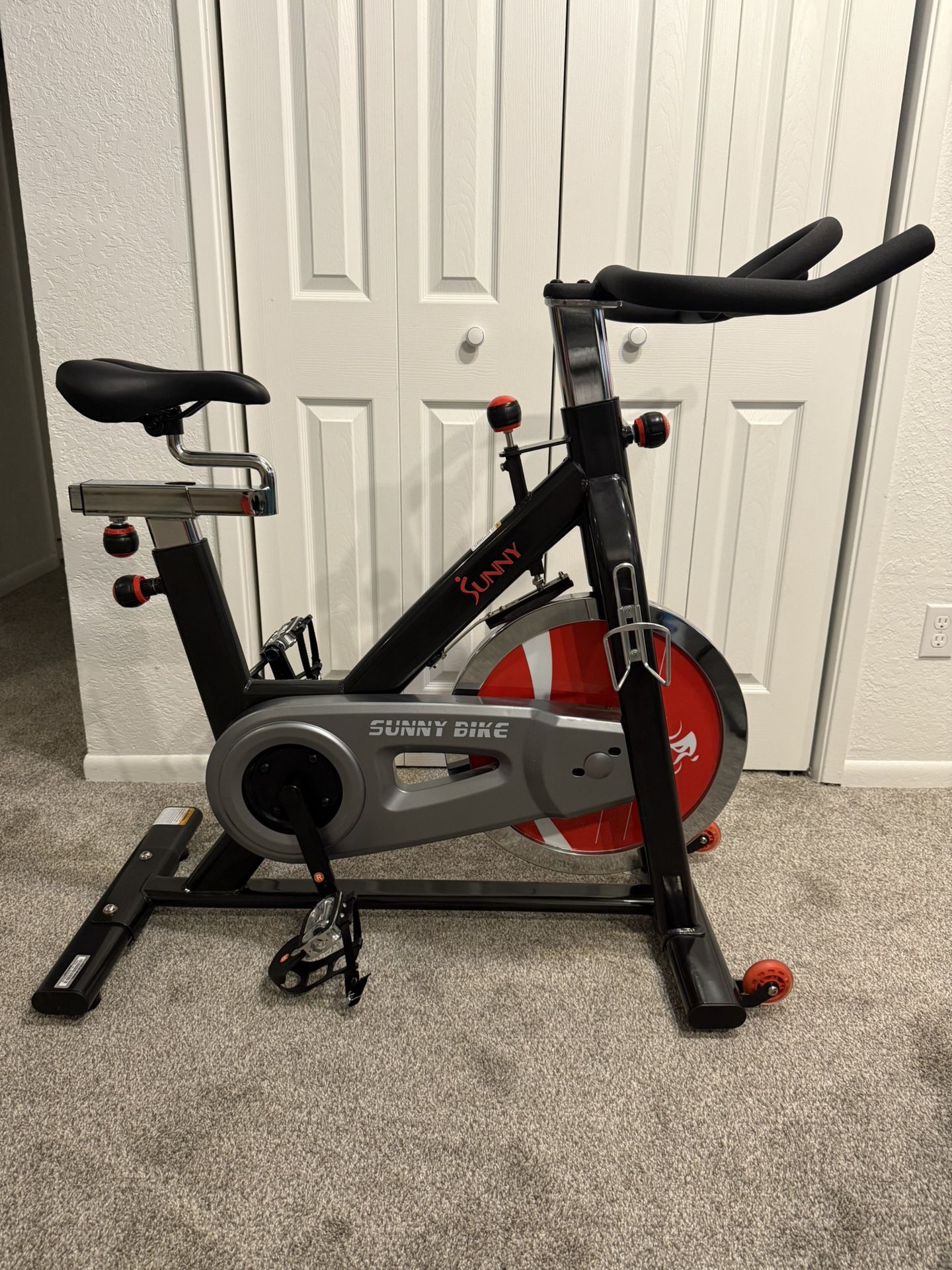 Sunny Health & Fitness Indoor Cycling Exercise Bike with Heavy 49 LB Chrome Flywheel - SF-B1002