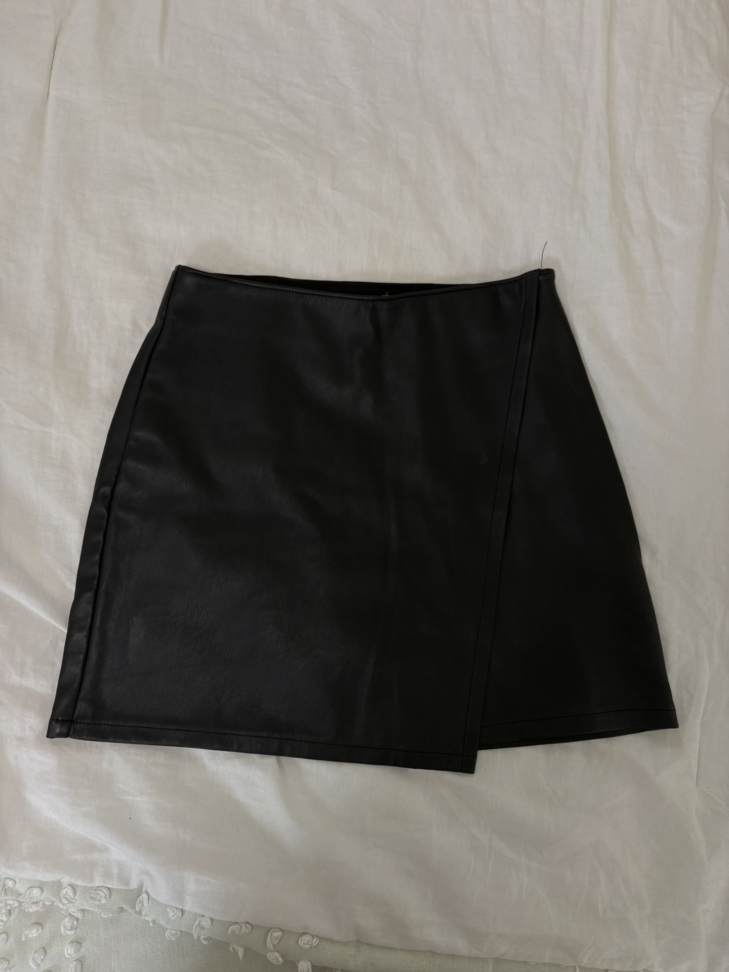 Black faux leather mini skirt
