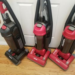 NEW condition  SANITARE COMMERCIAL BAGLESS VACUUM  , WITH ATTACHMENTS  , AMAZING SUCTION WORKS EXCELLENT  , IN THE BOX 