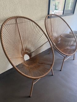 Two deep outdoor lounge chairs