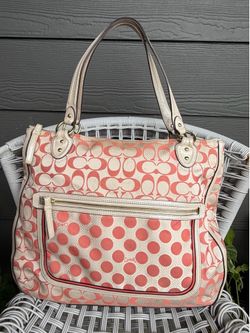 Coach brand tote-style bag, classic Y2K design with combined polka Dot print and the iconic monogram.