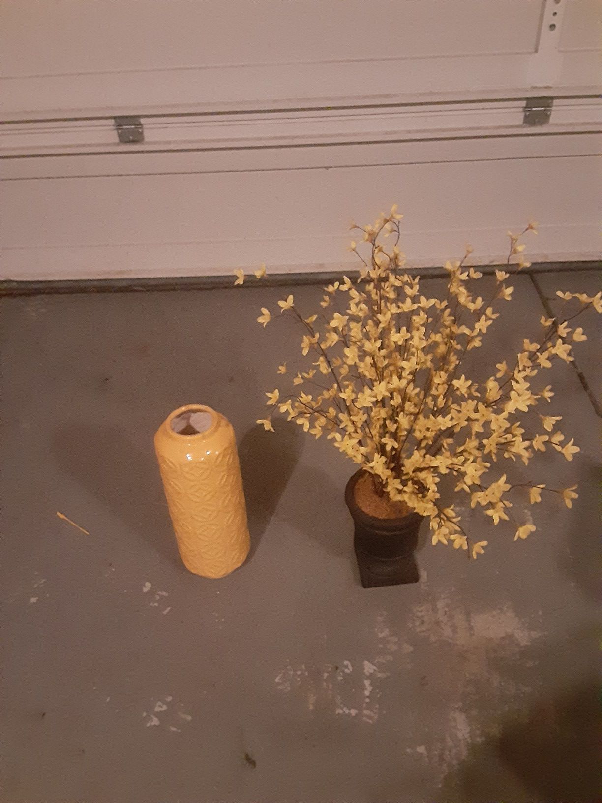 Yellow vase and flower vase