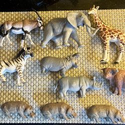10 Animal Figurines / Toys , Elephant , Giraffe , Rhino Etc.