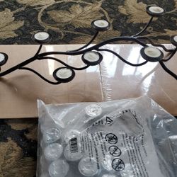 Candle Holder plus a big bag of tealight candles ( Approx 2 feet long )